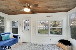 Perfect den or home office. Leads out to paver patio.