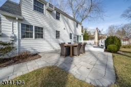Custom Stone walkway from front of home to Patio, Deck and Back yard