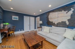 First Floor Bedroom with two closets. Used as Separate Living and Home Office