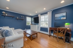 First Floor Bedroom with two closets. Used as Separate Living and Home Office