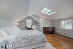 Natural Light with hardwoods. Room for Exercise bike or desk and more.