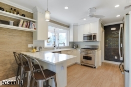Renovated kitchen with stainless steel appliances