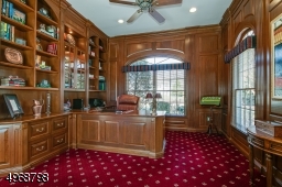 Custom cherry wood office with build in desk and bookcases