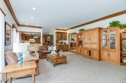 Wet bar with refrigertor and freezer! Opens to kitchen and living room