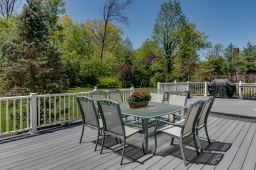 Expansive vinyl decking - opens to kitchen,family room and office!