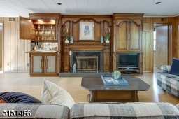 CABINETS OPEN & CLOSE TO HIDE TV & BAR