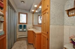 Built in cabinetry and linen closet