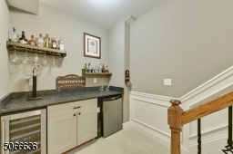 With wine fridge and mini-fridge.