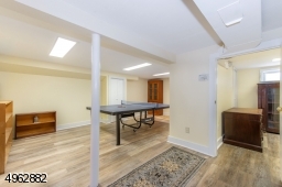 Enjoy this recreation space including an office and a utility room