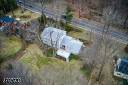 Set back off the road with sidewalks; large front and back yard