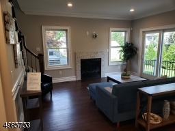 Gas fireplace and sliding door which leads to the patio