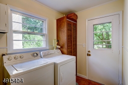 Directly off of the kitchen, all the modern day amenities you could ask for are tight here! Complete with built in's and access to deck and powder room!