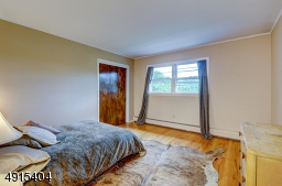 Spacious front house facing bedroom with double closet and organizers!