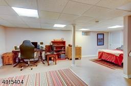 23 x12 With high ceilings and plenty of light, the possibilities are endless of what you can use this lower level finished space for!