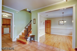 With stairs strategically placed, this floor plan delivers a bright and airy foot print with formal living spaces marked with crown moldings and gorgeous refinished floors in the front of the home and informal in the rear.