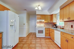 19 x 12  Perfectly situated at the rear of the home with access to family room, laundry and guest powder. Entrance from the garage makes unloading groceries a snap!