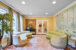 15' x 14' White oak flooring, recessed lighting, double french doors to 5 bedroom en suite