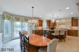 24" Travertine Tile Floor, Slider to elevated deck, open floor plan to Great Room