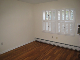 BRIGHT SUNNY BEDROOM WITH SHUTTERS