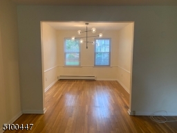 CHAIR RAIL SURROUNDS DINING ROOM.