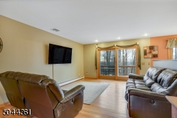 Large open space with hardwood flooring.