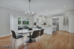 Center Island, Stainless Steel Appliances, Sliders to Deck