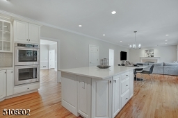 Center Island, Stainless Steel Appliances, Sliders to Deck