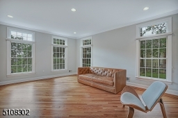 Oversized Windows, Hardwood Floors with Border Inlay, Crown Molding, Recessed Lights