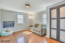 Spacious 1st floor bedroom is accompanied next to a full bath