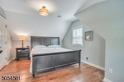 Cozy updated cape style 2nd Floor master bedroom.