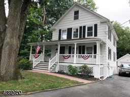 Classic colonial with wrap around porch