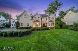 Custom Colonial on beautifully landscaped level lot.