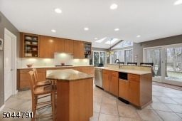 With two granite-topped islands, plenty of counter and cabinet space!
