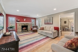 Gas fireplace (can be easily converted back to wood-burning) with stone surround