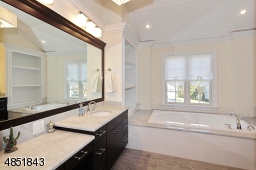 Separate his/her vanity's, spa shower, jaccuzzi style tub, private commode