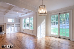 Glass doors out to private, fenced and level backyard