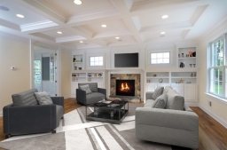 Custom built-ins, gas fireplace, coffered ceiling