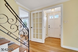 Enclosed vestibule entry with coat closet and additional door for added privacy.