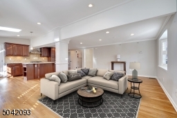Open floor plan features freshly finished floors throughout.