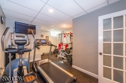 Lower Level private gym conveniently  located next to powder room