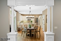 Sophisticated Moldings and fully appointed kitchen