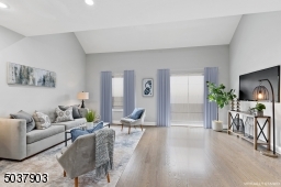 Features expansive 2 sets  of Anderson windows and a slider to Juliet Balcony. Beautiful 4.5 inch wide oak hardwood flooring
