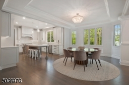 Breakfast area with bay windows and recessed ceiling