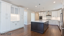 Quartz Counters, Custom Cabinetry, Jenn-Air Appliances