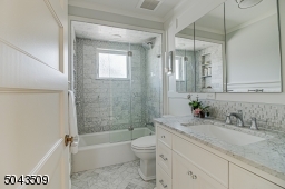 Custom Cabinetry, Marble Tile & Countertop