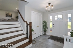 Spacious foyer with double closet