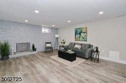 Finished basement with fireplace