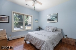 Hardwood floors, lighted ceiling fan and double closet
