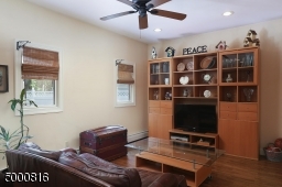 Note the recessed lights and the ceiling fan