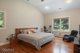High ceilings, room for a sitting area or desk
